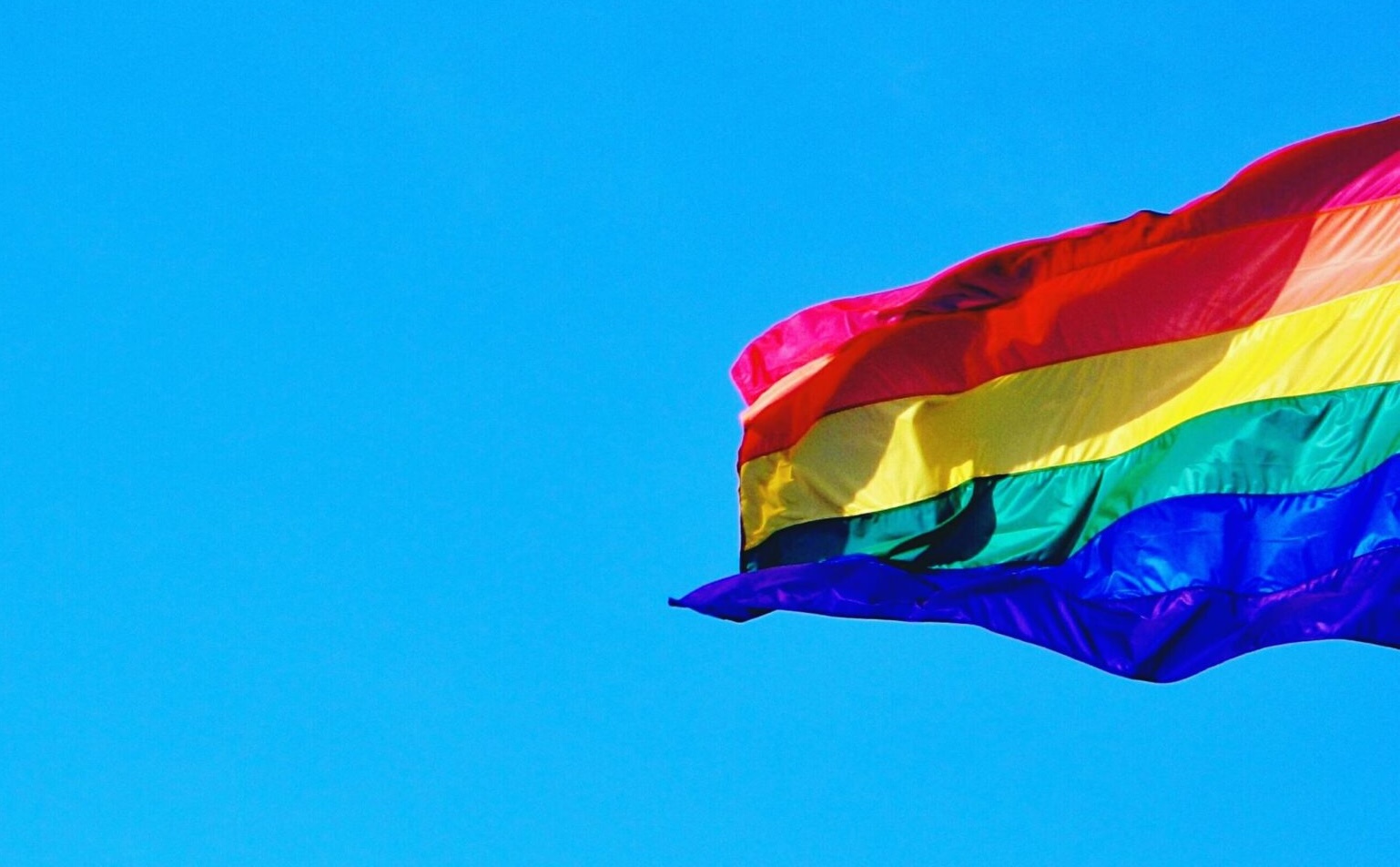 Rainbow flag blowing in the wind