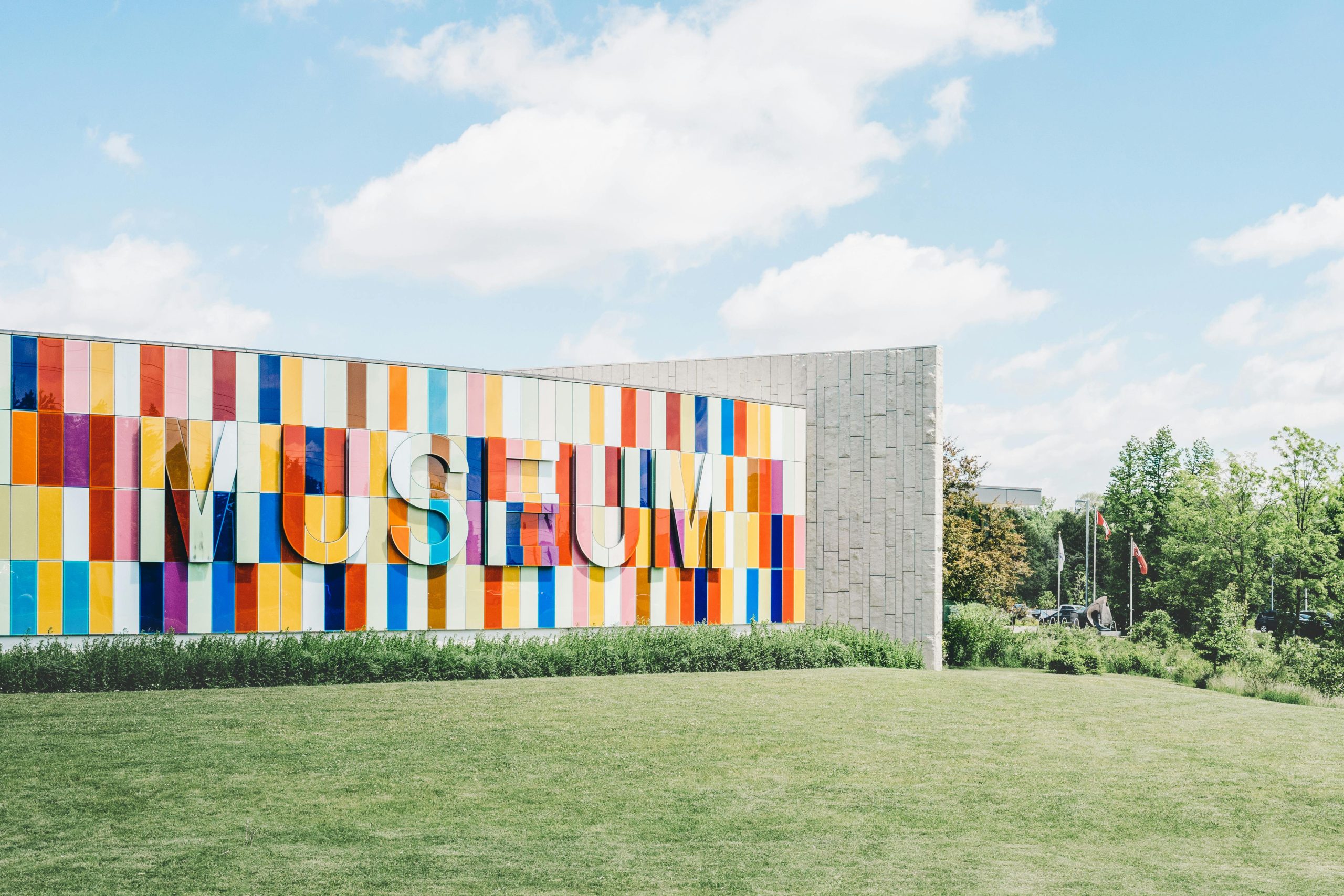 Contemporary museum with a mural of bold colored rectangles. 