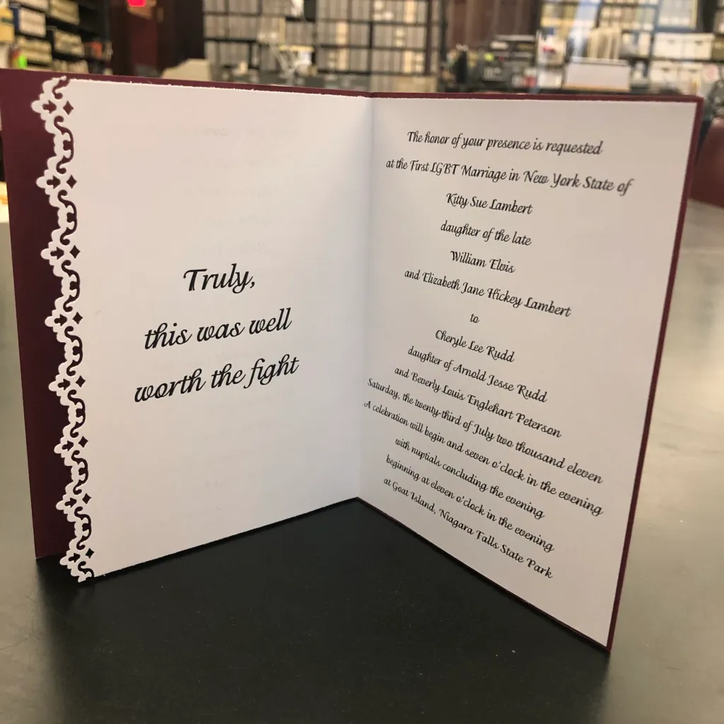 C3CA8755-2652-4167-B0D4-C5848557DBFD Wedding invitation of the first legal same-sex marriage in New York of Kitty Lambert-Rudd and Cheryle Lambert-Rudd